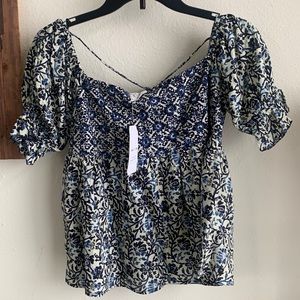 Navy blue floral baby doll too with tassel tie in the back. Never worn.
